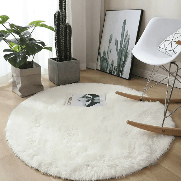 Grand tapis rond blanc 160 cm moelleux et décoratif, idéal pour apporter douceur et luminosité à un intérieur.