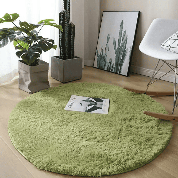 Grand tapis rond vert 160 cm moelleux et confortable, idéal pour une décoration naturelle et apaisante.
