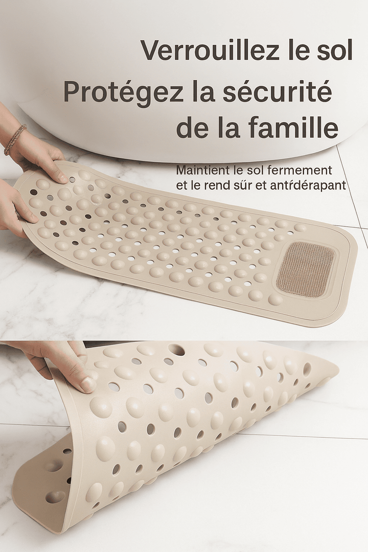 Personne soulève un tapis de bain antidérapant beige montrant les ventouses sous sa surface pour une fixation sûre au sol.