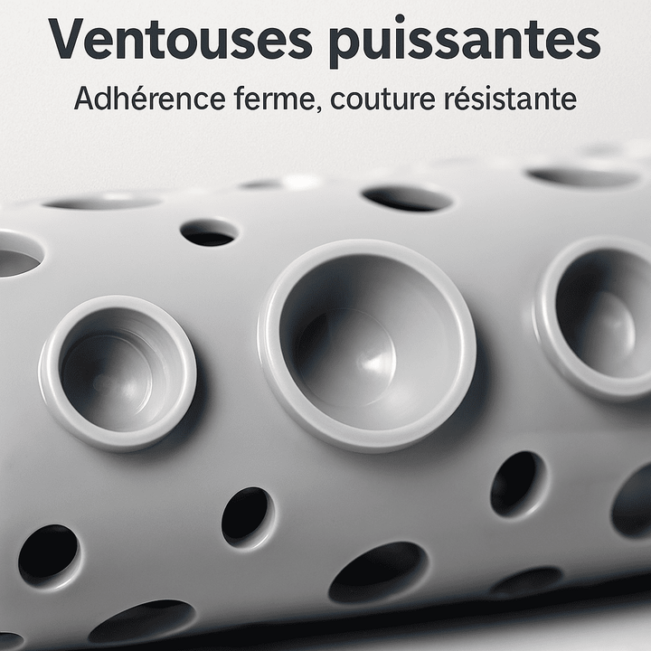 Gros plan sur les ventouses puissantes d’un tapis de bain antidérapant, montrant l’adhérence ferme du caoutchouc sur le sol.