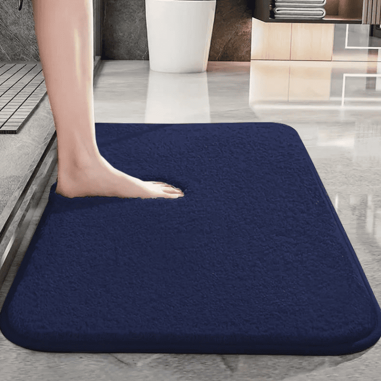 tapis de bain bleu absorbant et antidérapant pour salle de bain moderne