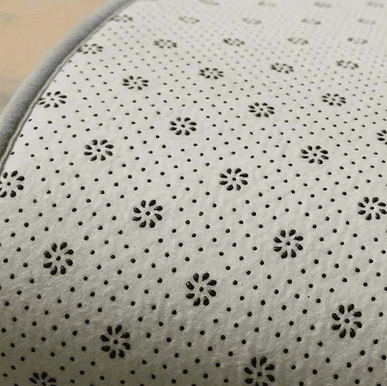 dessous de tapis de bain avec surface antidérapante pour une meilleure adhérence au sol