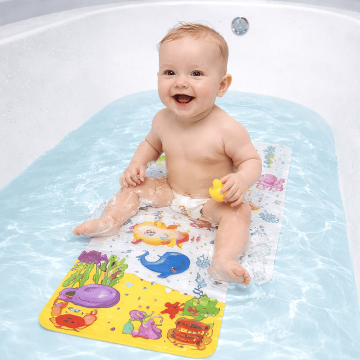 tapis de bain bébé antidérapant dans baignoire avec enfant assis en sécurité