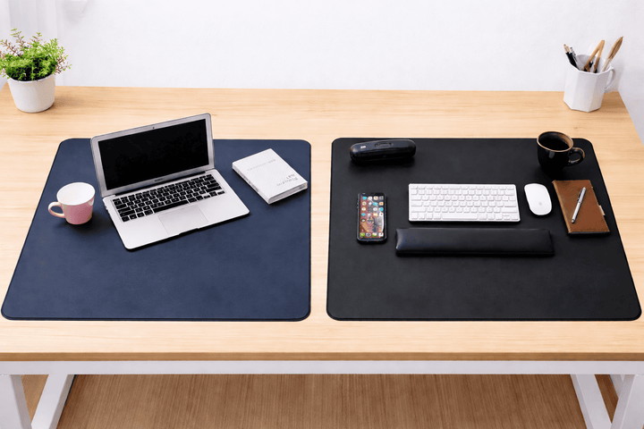 Tapis de souris géant 90x45 cm noir installé sur un bureau moderne avec clavier et accessoires