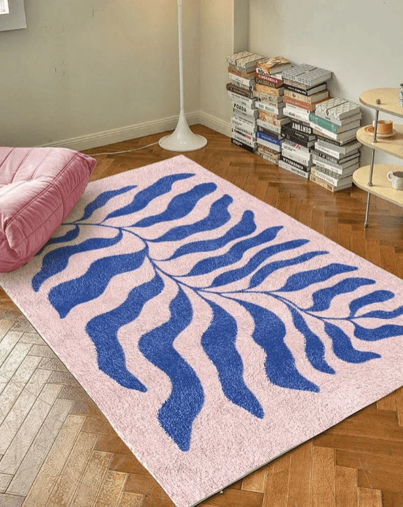 Tapis design moderne rose et bleu à motifs végétaux