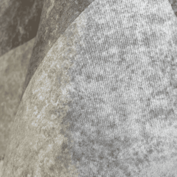 Zoom sur la texture douce du tapis salon poil ras 160x230 offrant confort et élégance au quotidien.